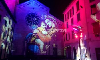 sacred images projections on the facade of Como church